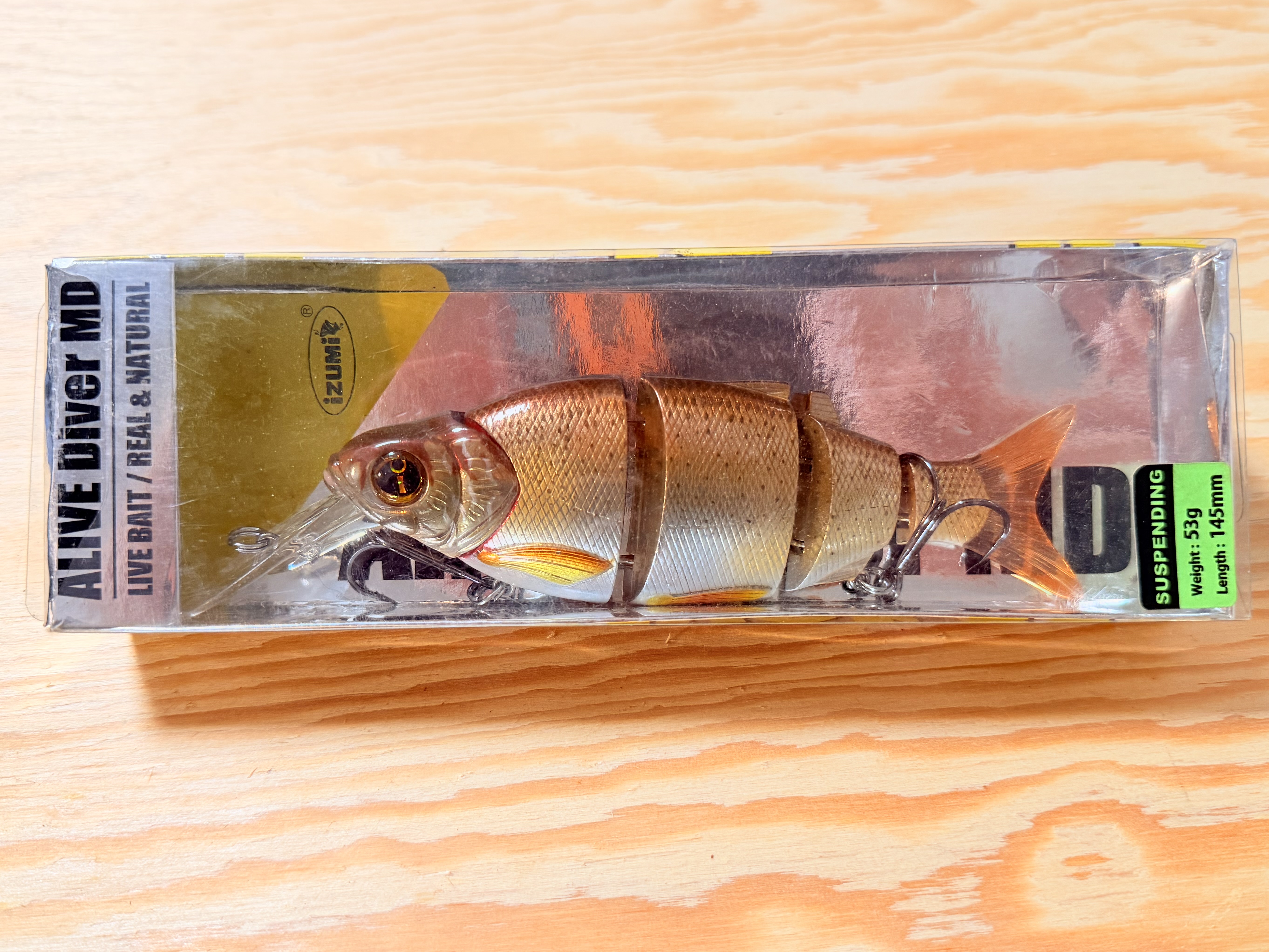 Wobler Izumi Shad Alive Diver MD Suspending / 14,5 cm / 03 Brown Gold Shinner